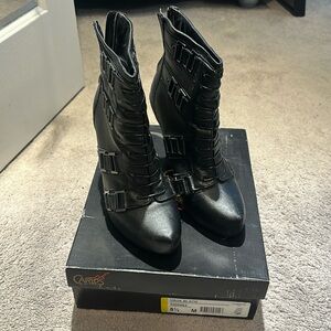 Carlos Urge Black boots, size 8.5